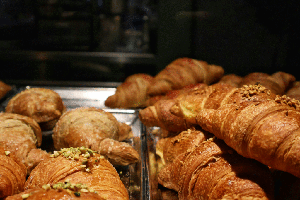 Selection of pastries on show in a glass cabinet
