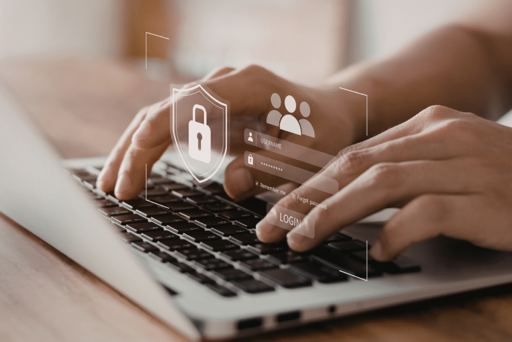 A laptop being used with a security icon showing