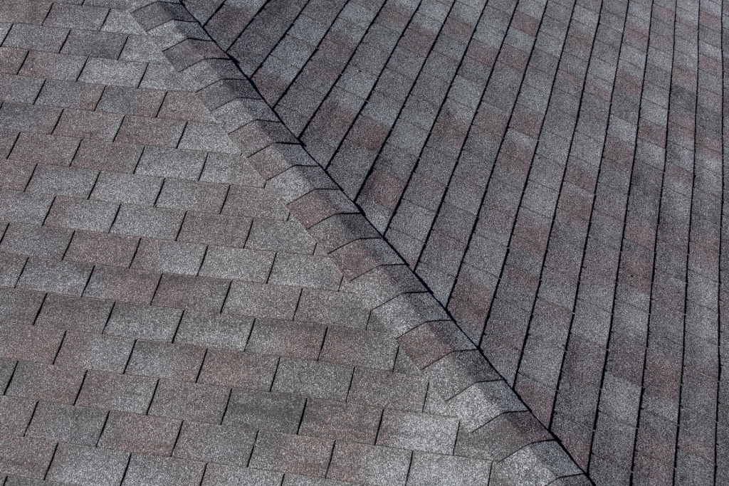 Bird's-eye view of a grey panelled roof of a residential building