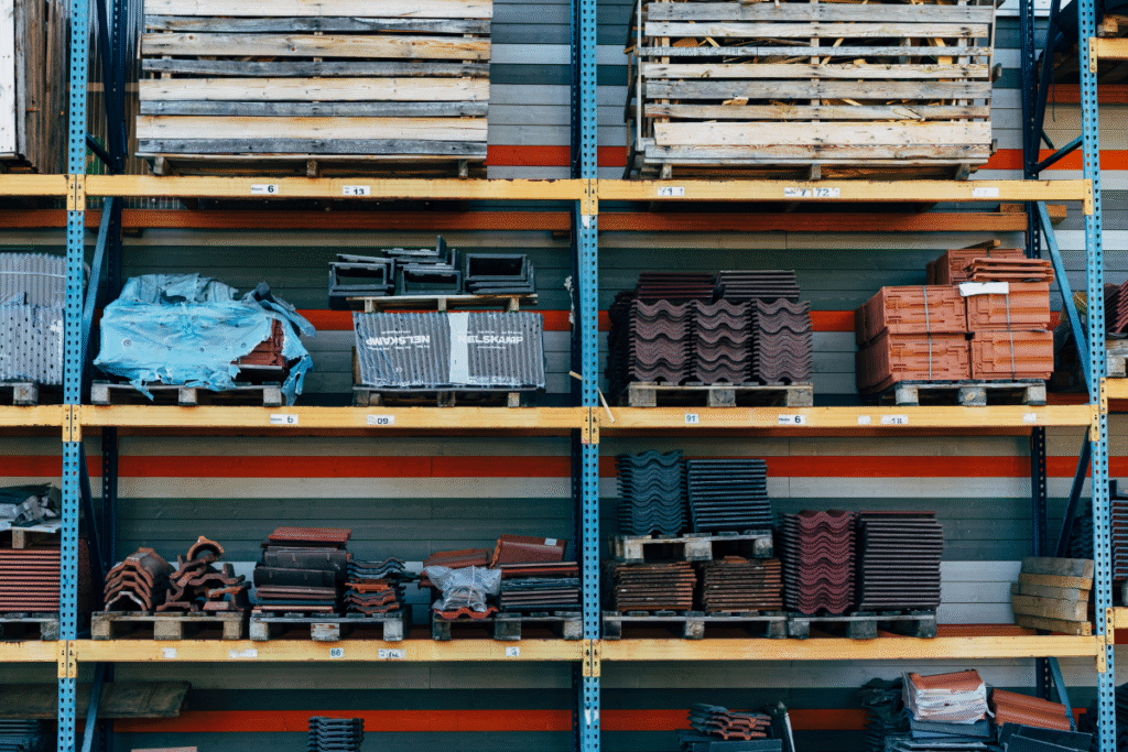 racks in a warehouse that are storing construction materials
