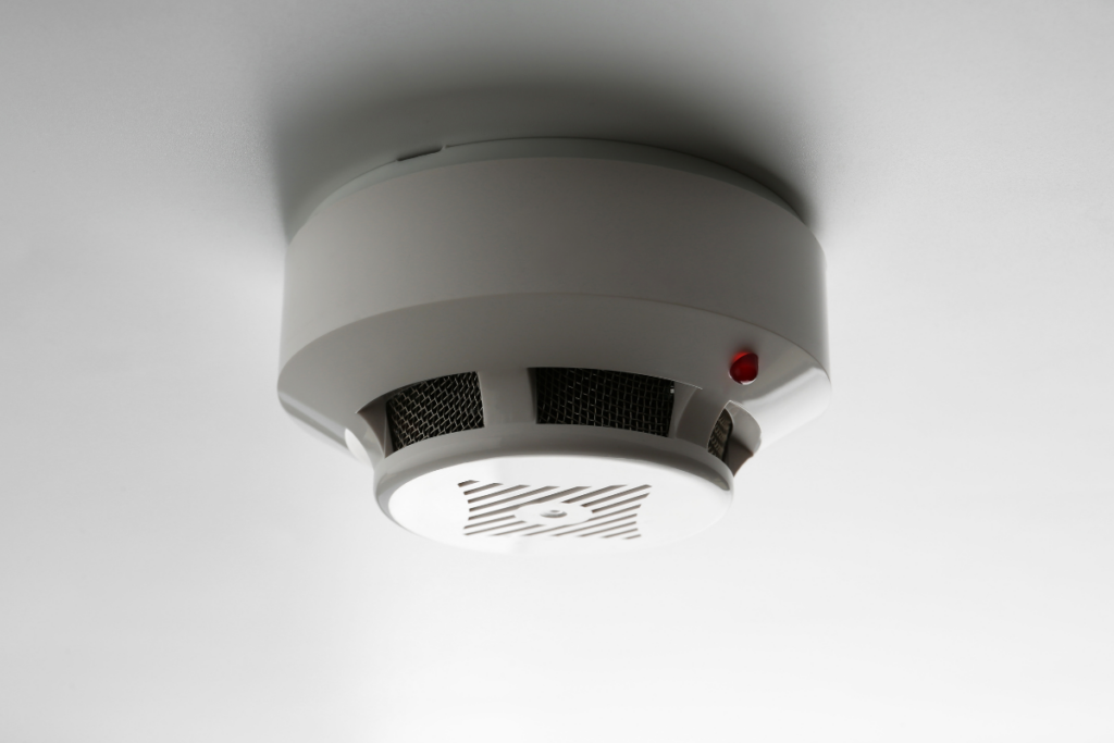 White ceiling-mounted smoke alarm
