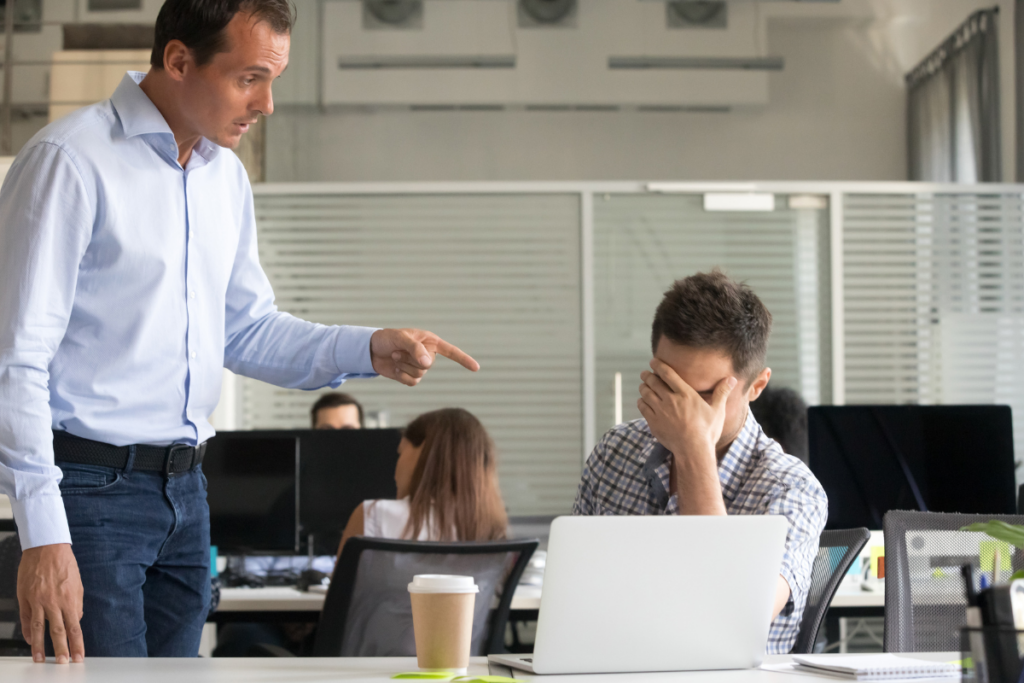 An employee trying to intimidate a fellow colleague