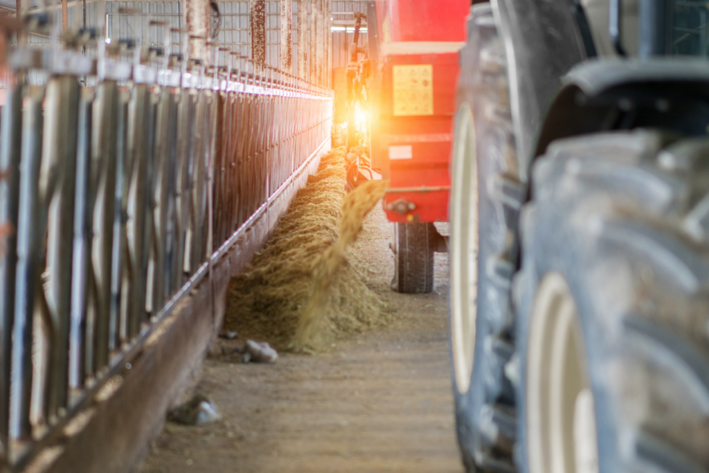 tractor connected to a feed mixer