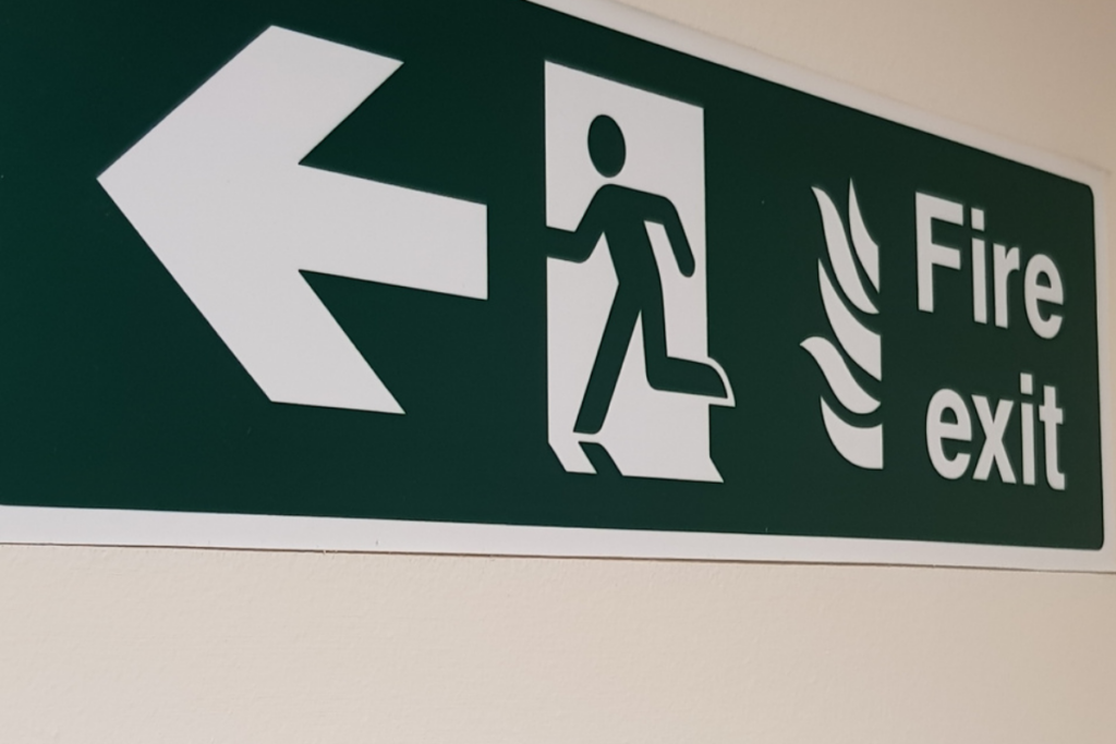 Fire safety sign stating fire exit