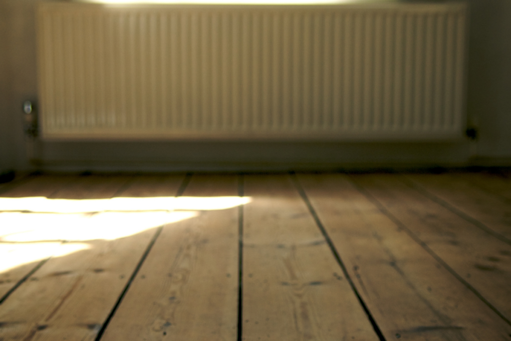floorboards and radiator in residential property